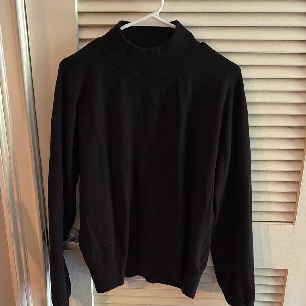 The Drop Classic Black Turtleneck Sweater with cutout back